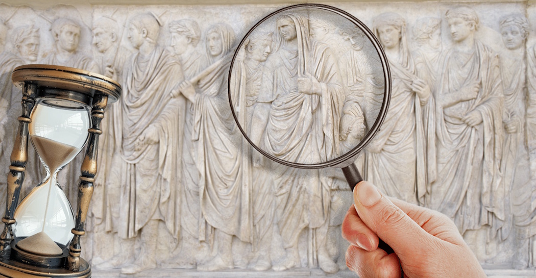 clessidra e lente di ingrandimento su rilievo dell'Ara Pacis clessidra e lente di ingrandimento su rilievo dell'Ara Pacis